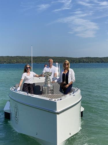 Iguana yachts helping deliver your precious cargo to any beach. In this case the Stanley Cup on Torch Lake 