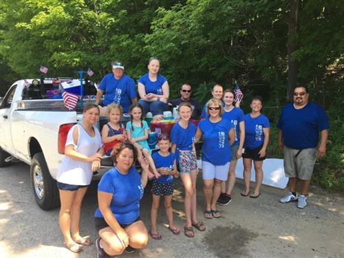 Part of our team and their families at the Beulah 4th of July Parade
