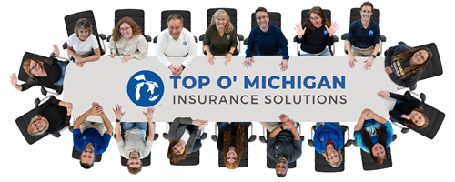 Top O' Michigan Team Photo around the conference table