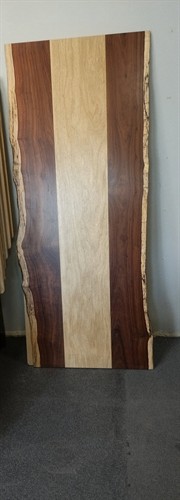 This is a gorgeous table or desk top for the boss babes out there. Our Founder created this as I wanted to see something a little bit demure. It is thin and elegant. One of a kind.? Granadillo (it's referenced as the wood that sings.?? It is also very durable. And can't forget the White Limba (excellent acoustic properties). $1400 we will deliver (local). 30 x 72. 