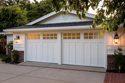 Clopay carriage-style garage doors adding curb appeal to homes in New Milford, CT.