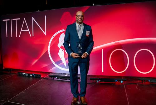 Dr. McGee receiving his top 100 leaders in Phoenix, AZ award