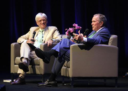 Former President George W. Bush speaking with our MC Doug McIntyre in Long Beach during the 2021-2022 Season