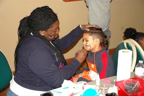 High School volunteers provided free face painting.