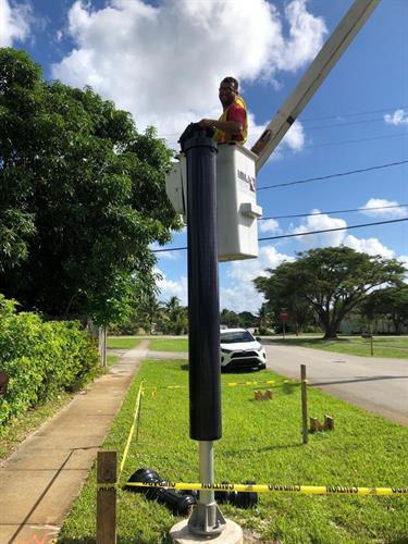 One of our Electricians adding light poles in our beautiful city, Pompano Beach.