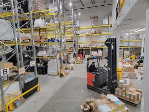 Gallery Image 2_-_CID_Warehouse_Employee___Forklift_(with_blur).jpg