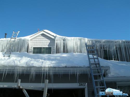 Ice dam and snow on roof
