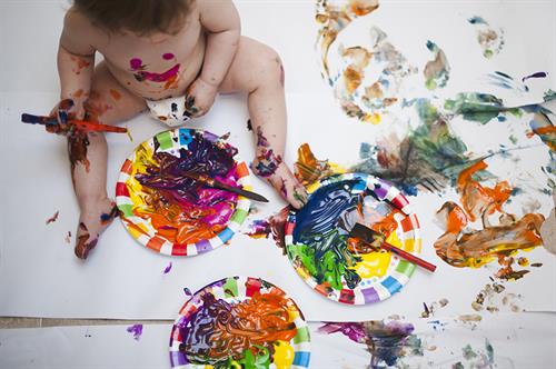 Kids playing with finger paint