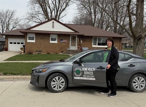 Gallery Image Ann_Langel_with_Car_2025.jpg