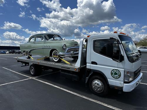 1953 Buick Special inbound to the dealership on our tow truck