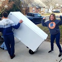 Receiving a donated refrigerator for a family in need