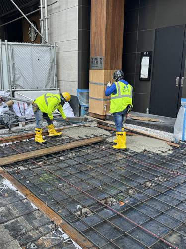 Overseeing Sidewalk Construction