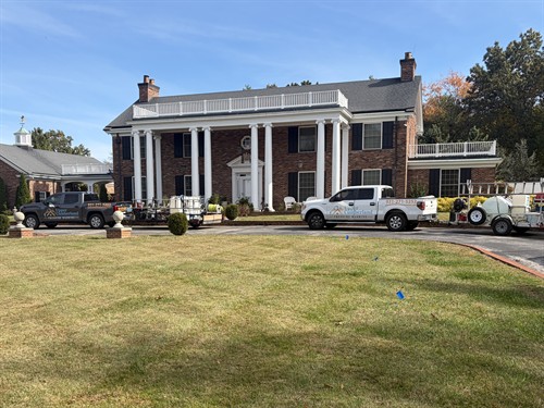 Upper Cumberland Pressure Washing trucks and equipment on site.