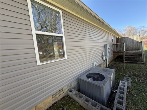 AFTER — Baxter house washing: siding.