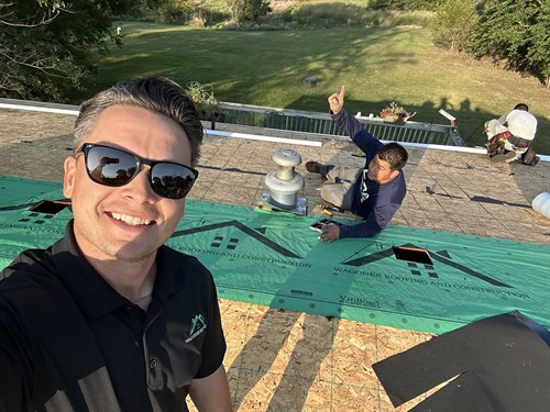 Gallery Image Blake_and_Jose_roof_install.jpg