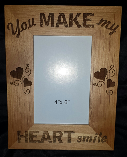 Customized photo frames in wood,  metal  or leatherette 