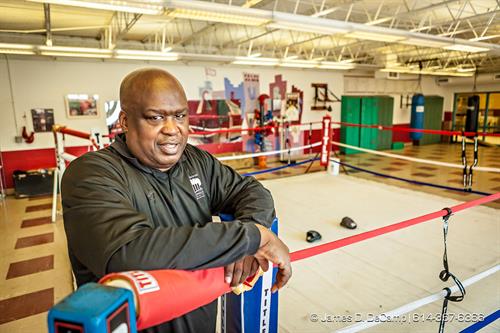 James 'Buster' Douglas and his son Artie at the Thompson Recreation Center. (© James D. DeCamp | http://www.JamesDeCamp.com | 614-367-6366)