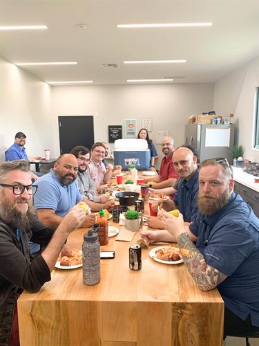 Straight Edge Technology employees gather for lunch