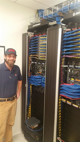 Josh proud of his work in a clients data room