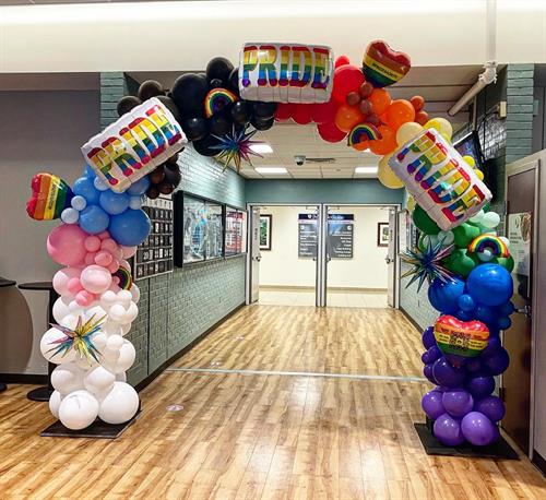 20ft organic arch for Penn Medicine for pride month.