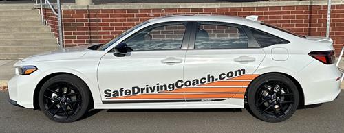 One of our 3 Honda Hybrids - Saving new drivers lives with defensive driving skills and helping to save our environment 