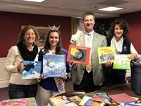 Jamie and the team collected book in support of Miss Outstanding Teen Gate City, Julia Coryea, in her efforts to allow every child access to books