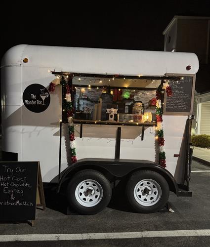 The Wander Bar's mobile bar trailer is decorated for bar service at holiday party in Londonderry New Hampshire