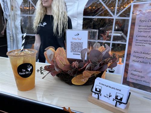 Event bar set up with autumn decor features Fall Sangria cocktail in Hampstead New Hampshire