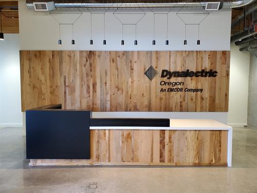 Reception Wall in Maple with matching Desk in White laminate, steel and maple Reception Wall in Maple with matching Desk in White laminate, steel and maple