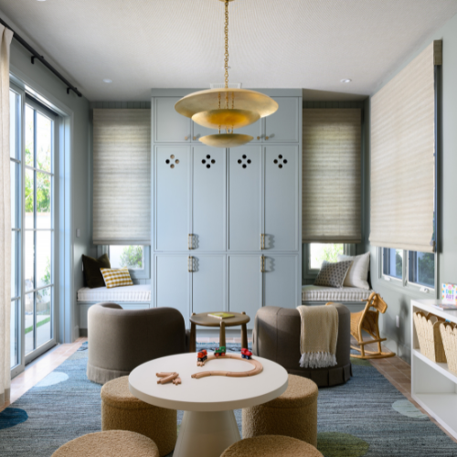 Playroom with outside mounted Roman shades in Barcelona - Stone