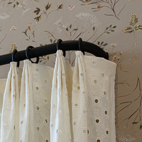 Close up of Natalie - Snow drapery on flat back curtain rod