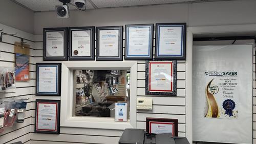 One of two walls of awards our company has received over it 40+ years in business.