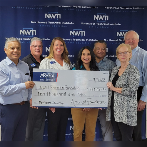 The Arvest Foundation gives a $10,000 donation to the NWTI Education Foundation to use for Marshallese students.