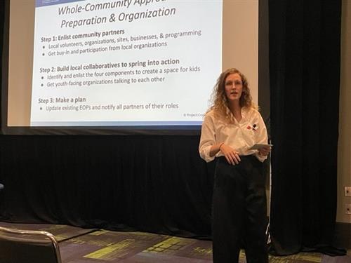 COO, Lorraine Schneider presenting at the annual IAEM conference 