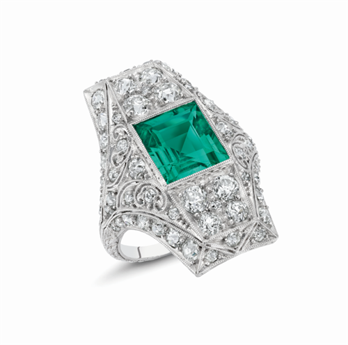 Art Deco ring with 3 carat Colombian emerald in platinum. 