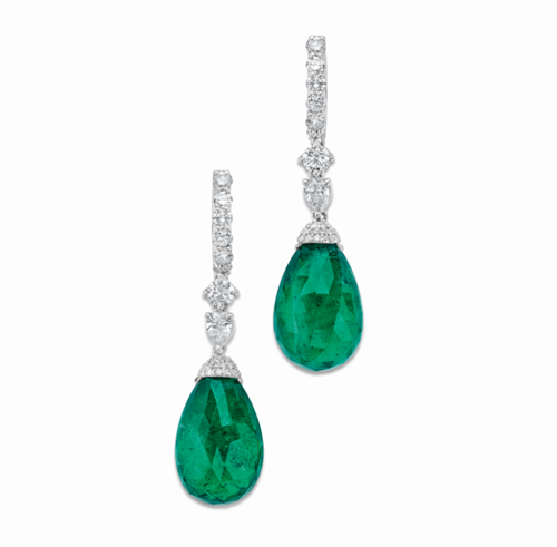 Diamond drop earrings with 27.72 carats of emeralds in 18k white gold. 