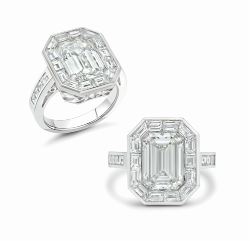 Ring with 4.14 carat emerald cut diamond and custom 2.30 carat platinum bezel setting. 