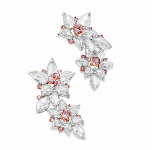 Flower earrings with 9.84 carats of pink and white diamonds in 18k white and rose gold. 