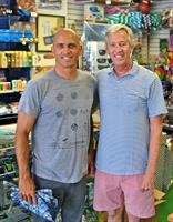 Rick and Kelly Slater chilling at the shop