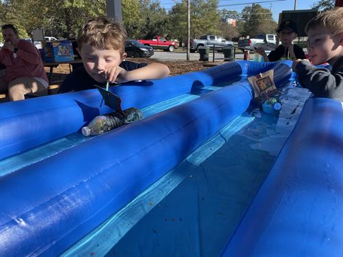 Raingutter Regatta with Lion scout