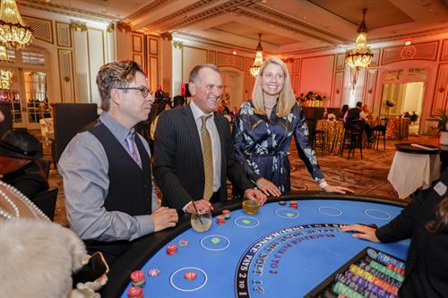 Aces Up blackjack table and players