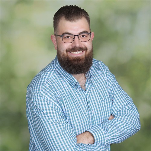 Gallery Image Shop_w_Aaron_Headshot_Crop_Green.jpg