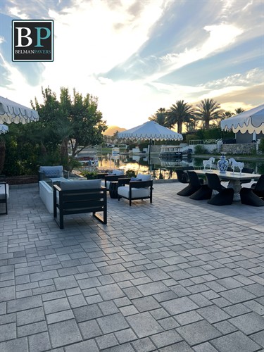 Transform your backyard with a custom paver patio deck.