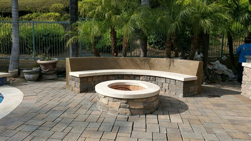 Custom pavers, seating walls & fire pits for outdoor living.