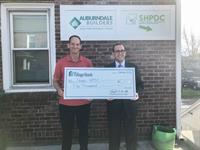 The Village Bank donates $5,000 to Studio for High Performance Design & Company