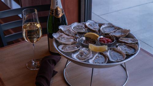 Raw Oysters over ice with Champagne on the side | Fresh, local, perfect | The Bluebird Bar | West Newton