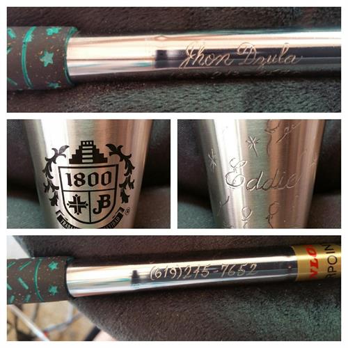 Example of metal shots and golf club sticks hand engraved during a corporate event. 