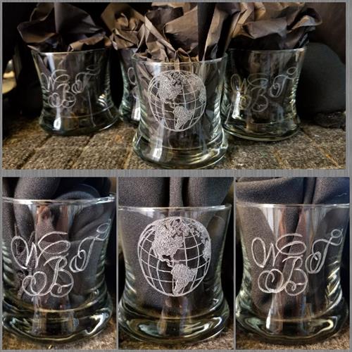 These whisky glasses have the recipients initials hand engraved. The Globe Logo was hand engraved with some stippling effects to give it a nicer look.