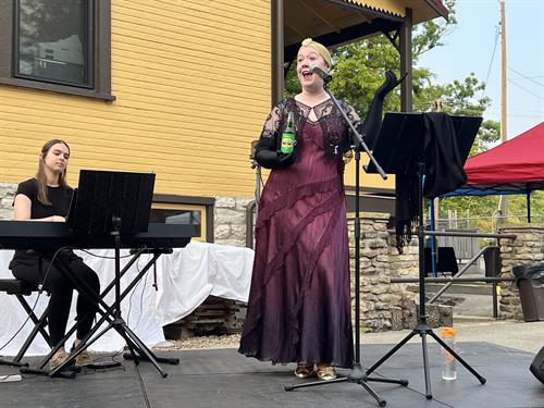 Cecelia "Cece" Otto of An American Songline performs her Prohibition-themed program at the Ligonier Valley Rail Road Museum's inagural "Railroad Rendezvous: An Evening of Music and History at the Darlington Station" on June 10, 2023.