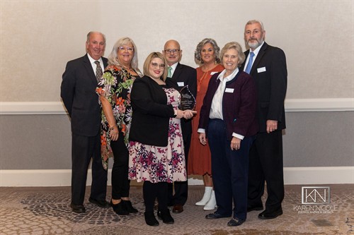 members of Laughlin's staff accepting the 2020 BBB Torch Award for Ethics